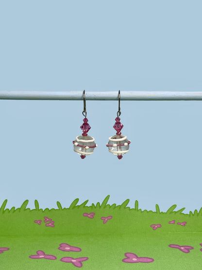 White dotted and striped earrings