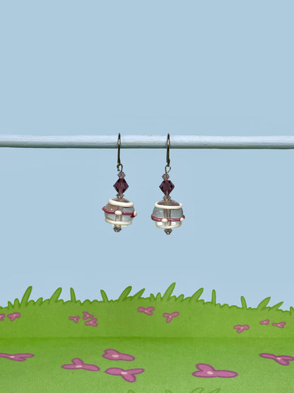 White dotted and striped earrings